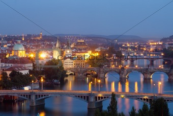 czech republic, prague - bridges over vltava river at dusk