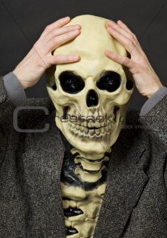 Amusing scared person in mask - skull