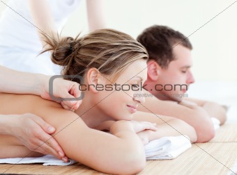 Loving couple having an acupunctre therapy
