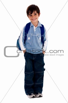 Young school boy smiling and looking away