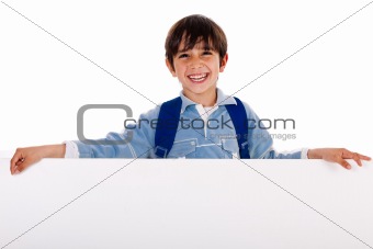 Charming kid holding blank board