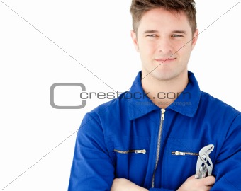 Charismatic caucasian worker holding tool 