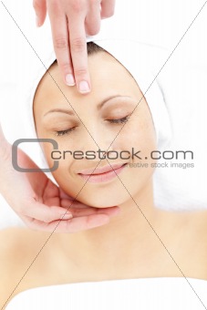 Relaxed  woman enjoying a head massage