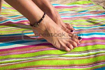 woman ankle with bracelet