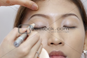Applying makeup
