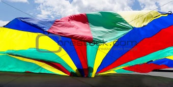 color parachute silhouette child play