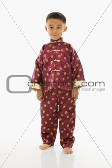Boy in Asian attire.