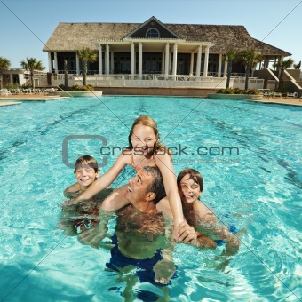 Family at pool.