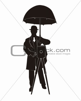 Silhouette of the photographer with an umbrella