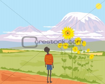 african boy with sunflower