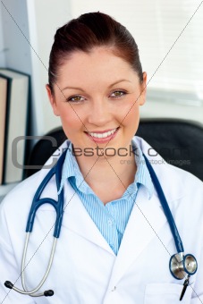 Happy female doctor smiling at the camera