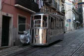 Old cable car in the street of Lisbon, Portugal 
