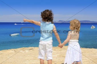two sister girls summer Cala Saona Formentera