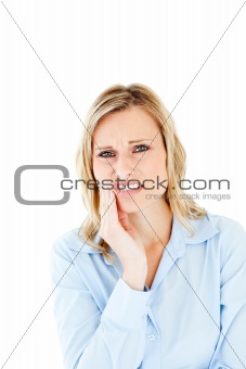 Dejected businesswoman with toothache