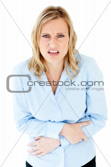 Depressed businesswoman with stomachache 