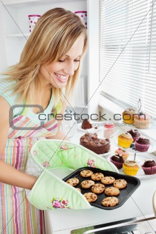 Charming woman baking in the kitchen