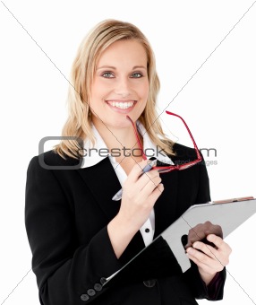 Charismatic businesswoman holding a clipboard 
