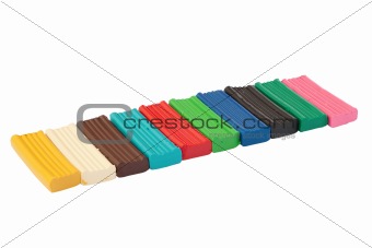 Row of colored plasticine bricks