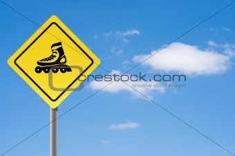 Sign with roller skates.