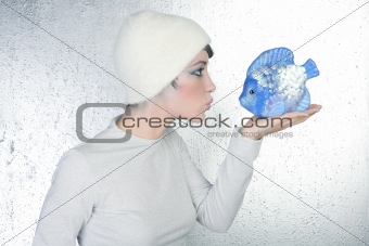 woman profile holding fish kissing expression