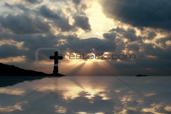 Cross in a Beautiful Sunset Reflection