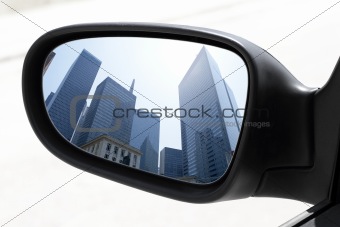 rearview car driving mirror view city downtown