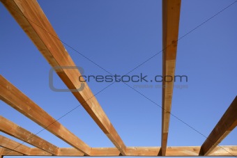 blue sky wooden golden awning beams