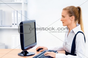 Woman works at the computer