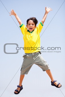 Smart kid jumping high in air