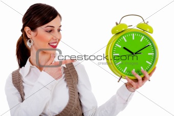 lady pointing at alarm clock