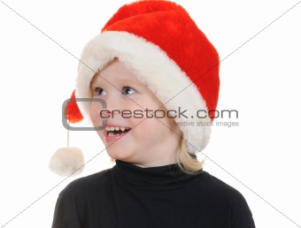 The child in a hat santa claus