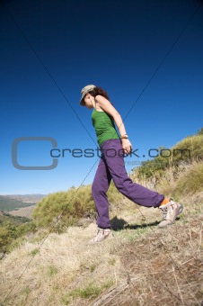 female walking on slope