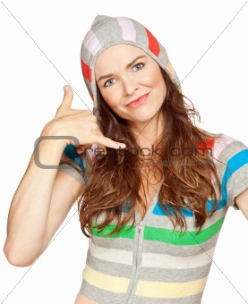 Beautiful young woman smiling a making a call me gesture