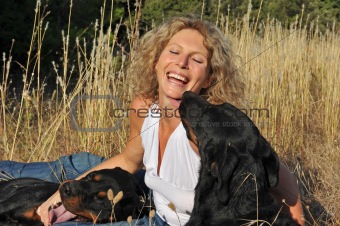 laughing woman and dogs