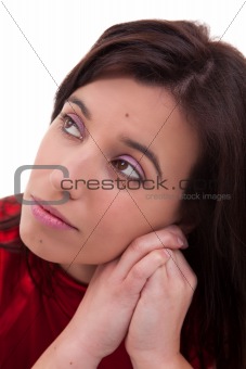 pretty woman thinking with hand on the face