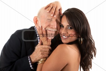 Rich elderly man with gold-digger companion or wife