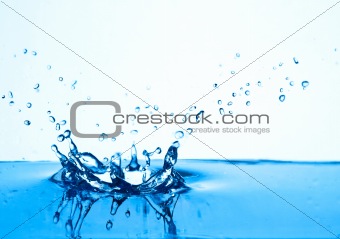 blue water splash, white background.