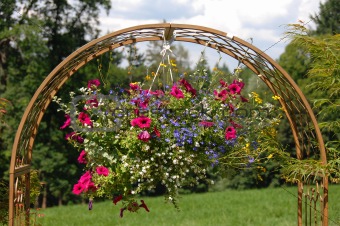 a decoration in the garden with a pot flower