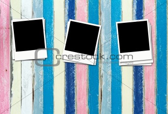 Blank Photos on pastel painting wood background