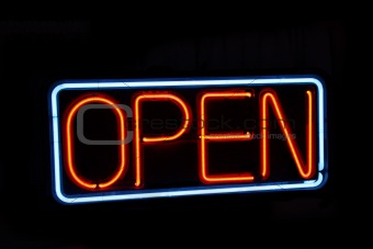 Neon open sign against black