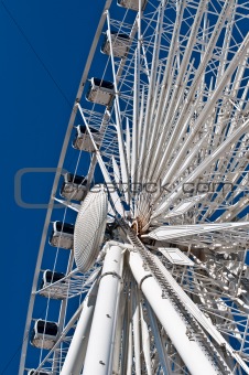 Large White Ferris Wheel with Enclosed Cars