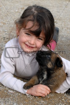 girl and puppy