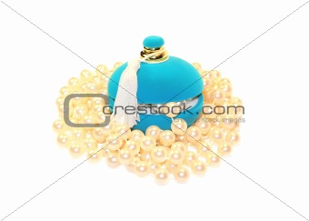 Blue gift box and pearls isolated on white