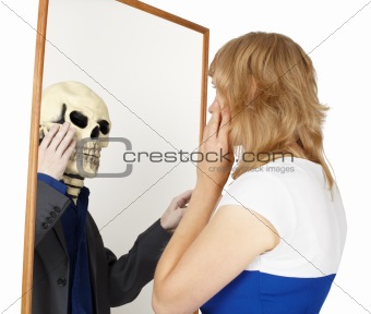 Girl looks into false mirror