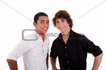 friends: two young man of different colors,looking to camera and smiling, isolated on white, studio shot