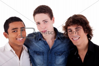 friends: three young man of different colors,looking to camera and smiling, isolated on white, studio shot