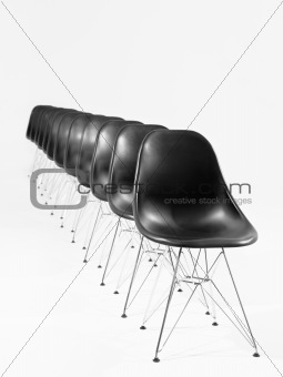 Black chairs in a row