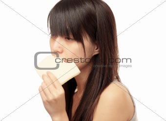 chinese girl look sad and eat bread