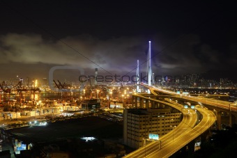 container terminal and bridge in Hong Kong at night