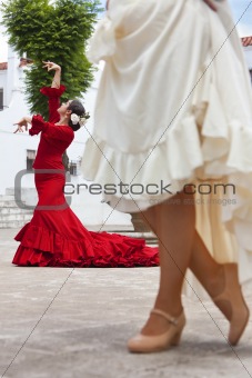 Two Traditional Women Spanish Flamenco Dancers In Town Square